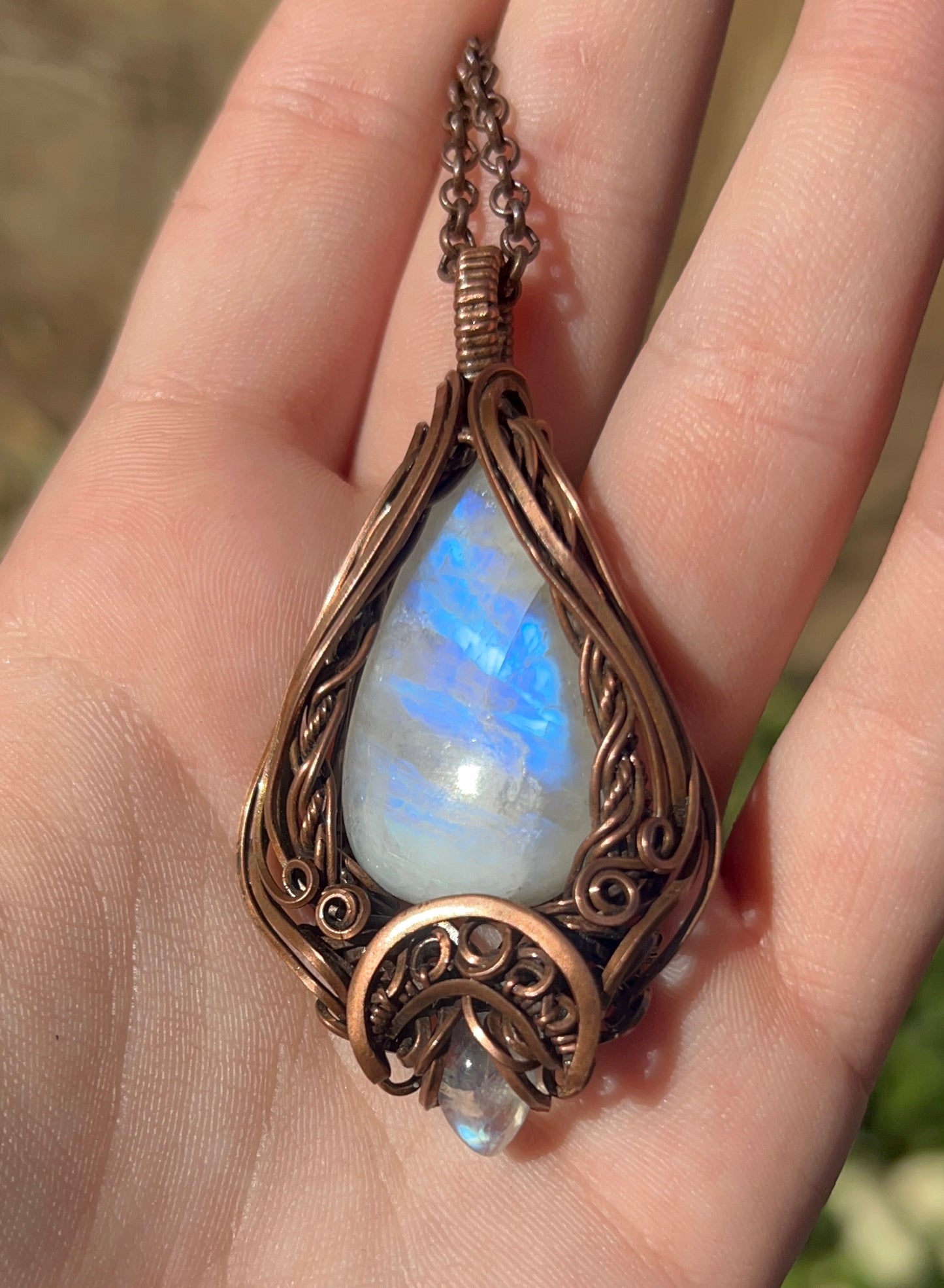 flashy blue moonstone copper pendant