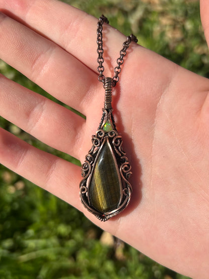 stunning tigers eye and ethiopian opal copper pendant