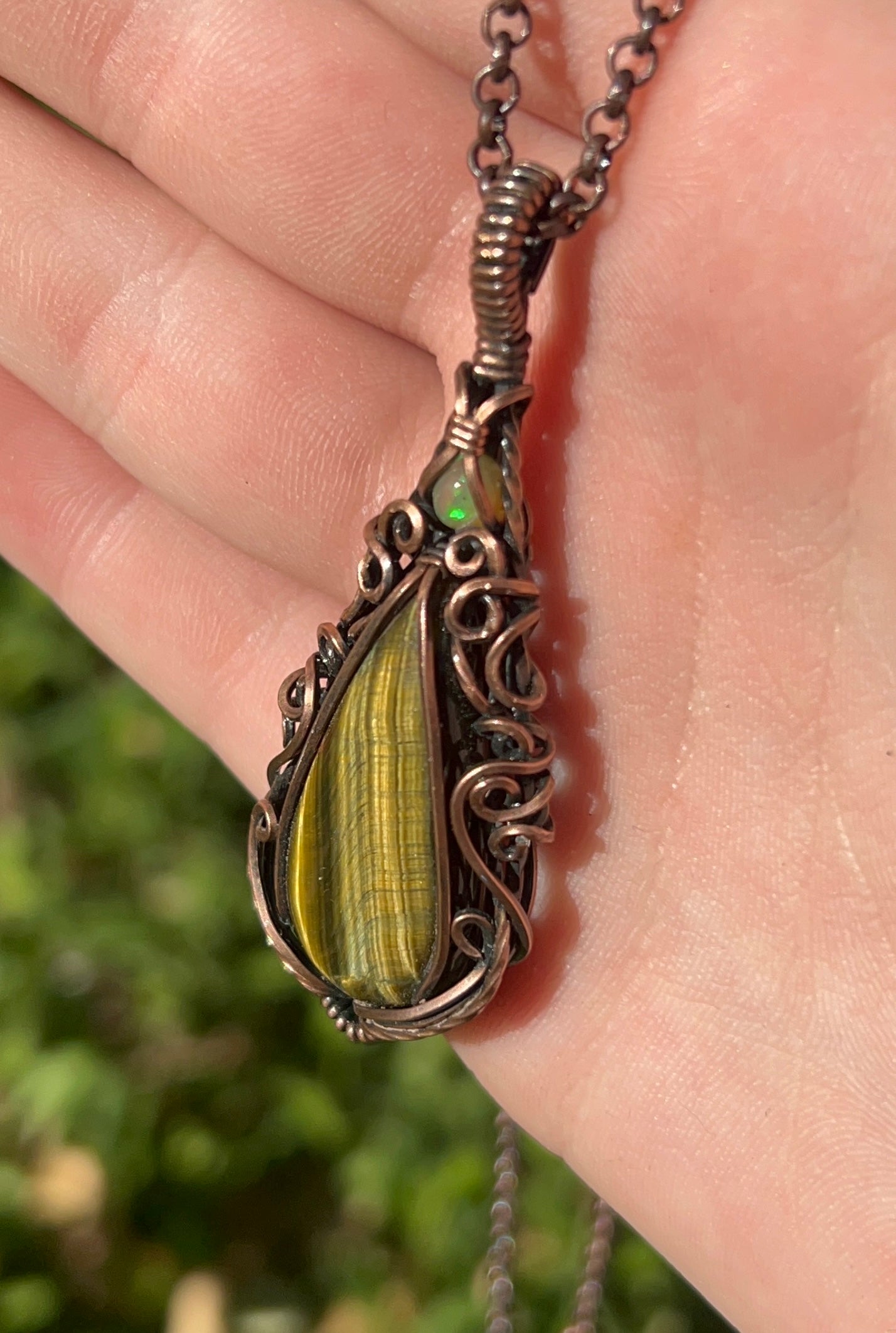 stunning tigers eye and ethiopian opal copper pendant