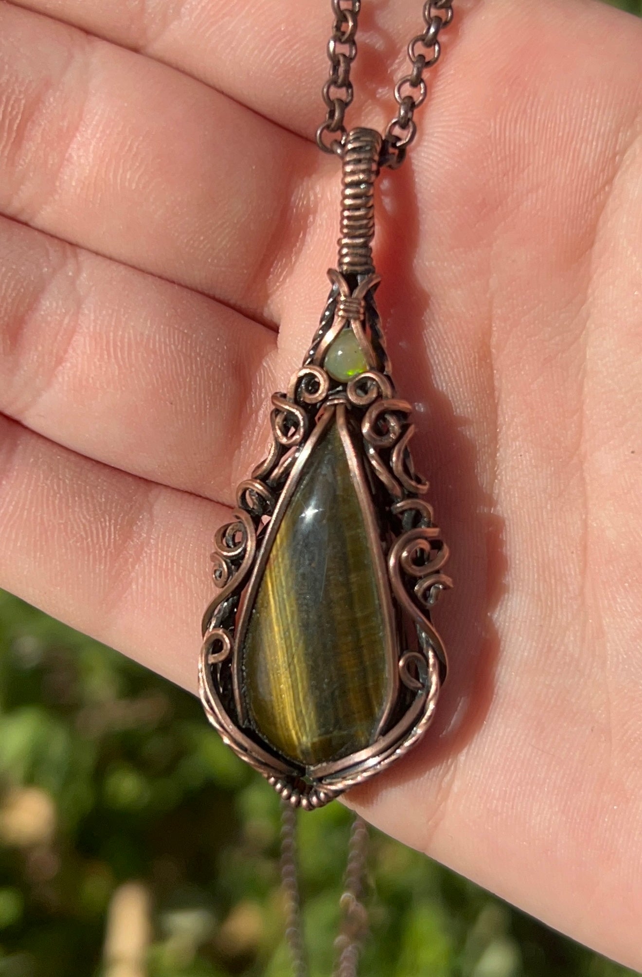 stunning tigers eye and ethiopian opal copper pendant